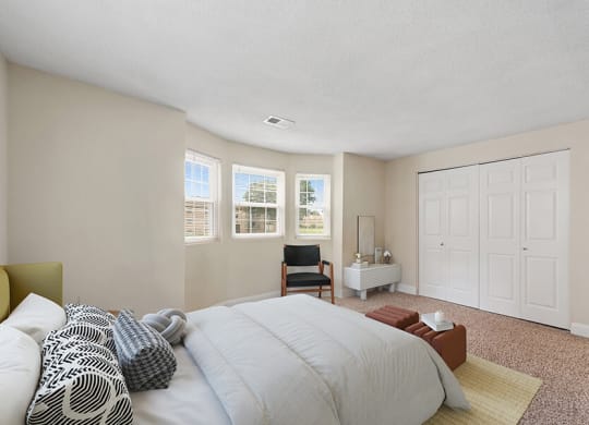 Model Bedroom with Carpet and Closet at Meadows at Marlborough Apartments in Boston, MA.