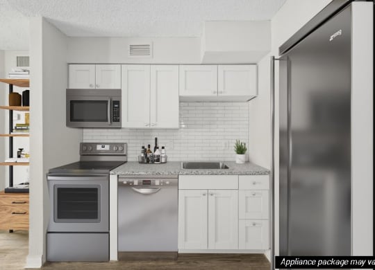 Model kitchen with white cabinetry