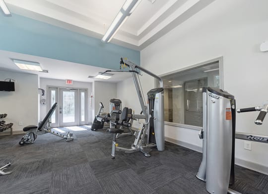 Community Fitness Center with Equipment at The Commons at Haynes Farm Apartments in Boston, MA.