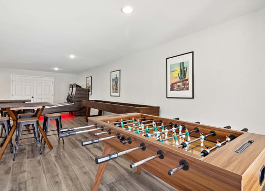 Community Clubhouse with Game Tables and Lounge Furniture at Loma Vista Apartments in Las Vegas, NV.