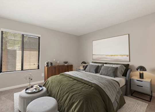 Model apartment bedroom with a bed at Saratoga Ridge, Arizona