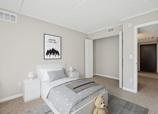 Model Bedroom with Carpet and Closet at Elevate on Parkway Apartments, Burnsville, 55337