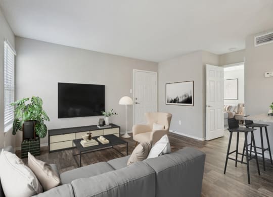 a living room with a couch and a television