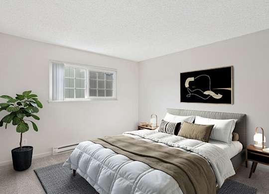 Model Bedroom with Carpet and Window View at Los Gatos Landing Apartments located in San Jose, CA.