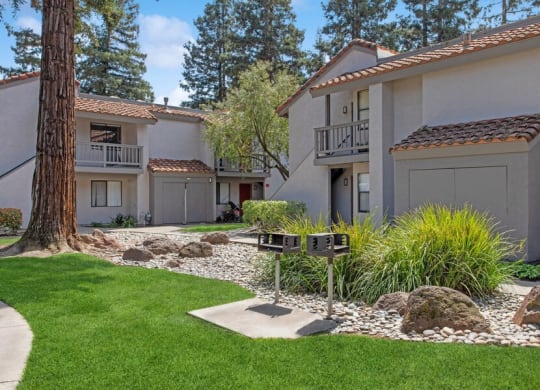 Exterior Community Building and Landscape at Creek 2645 Apartments in Sacramento, CA.