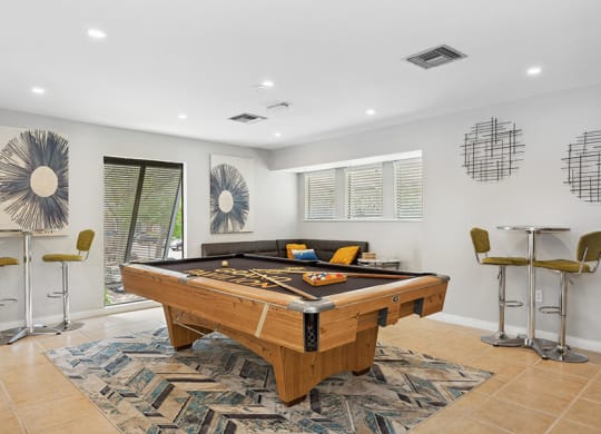 Community Clubhouse Game Tables at Grand Pavilion Apartments in Tampa, FL.