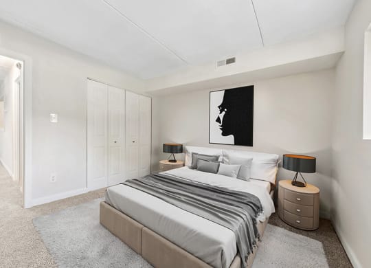 Model Bedroom with Carpet and Closet at Heights Marlborough Apartments in Boston, MA.