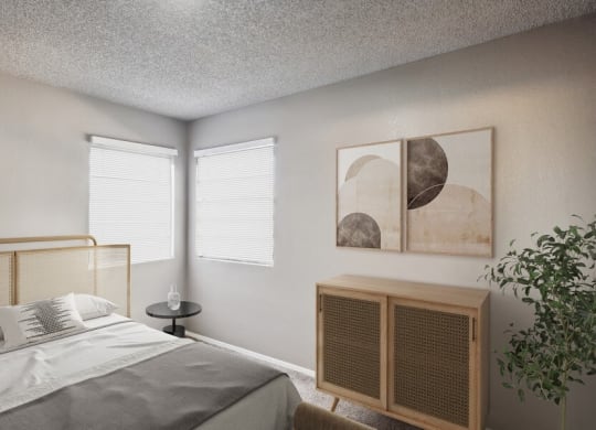 Model bedroom with corner windows at Bella Vista Apartments in St. George, Utah.