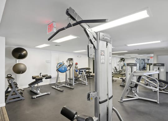 Community Fitness Center with Equipment at Hilands Apartments in Tucson, AZ.