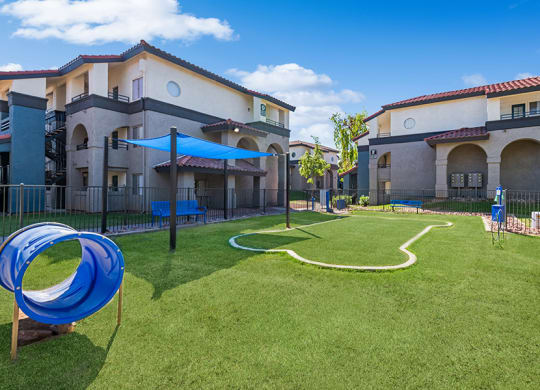 Community Dog Park with Agility Equipment at Stillwater Apartments in Glendale, AZ.