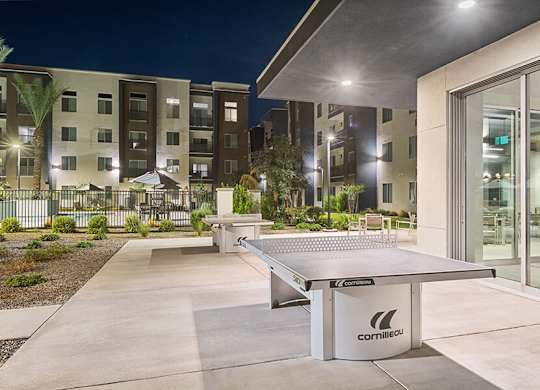 Outdoor Game Tables at Glen 91 Apartments located in Glendale, AZ.