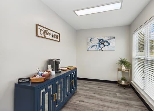 Community Clubhouse Coffee Bar Area with Coffee Supplies at Parc at Creekside Apartments in Kansas City, MO.