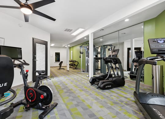 Community Fitness Center with Equipment at Crystal Creek Apartments in Phoenix, AZ.