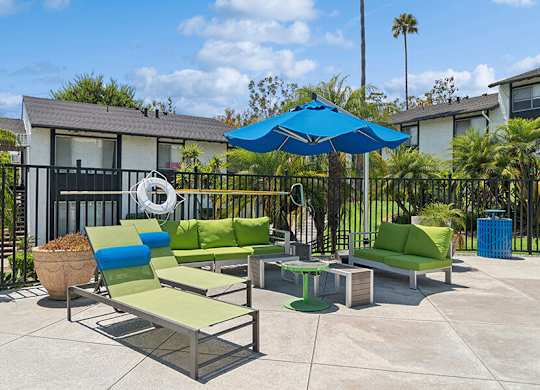 Outdoor Patio with Lounge Furniture at Fullerton Hills Apartments located in Fullerton, CA.