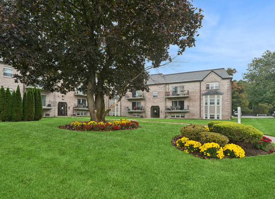 Exterior Community Building and Landscape at Meadows at Marlborough Apartments located in Marlborough, MA.