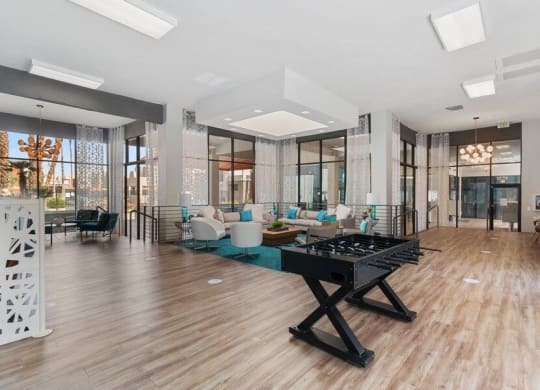 Clubhouse lobby and lounge area with game tables