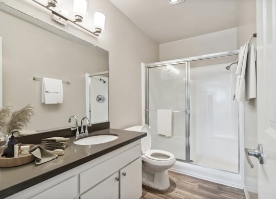 Model bathroom with tub and shower combo