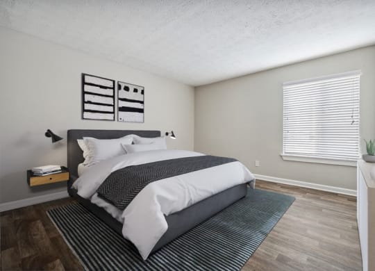 Model bedroom with queen-size mattress