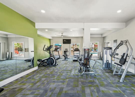 Community Fitness Center with Equipment at Stonegate Apartments located in Las Vegas, NV.