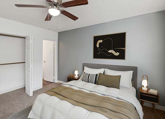 Model Bedroom with Carpet and Closet at Lakeside Casitas Apartments located in Tucson, AZ.