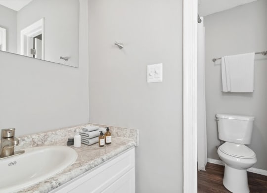 Model bathroom with white vanity