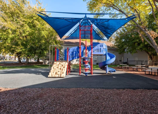 Community covered playground at Bella Vista Apartments in St. George, Utah.