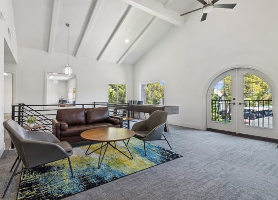 Community Clubhouse with Lounge Furniture at Meadow Ridge Apartments located in Las Vegas, NV.