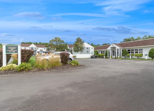 Exterior Community Building and Landscape at Village at Marshfield Apartments located in Marshfield, MA.