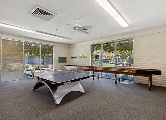 Game room with a ping pong table and a pool at Walnut Creek Manor Apartments in Walnut Creek, CA
