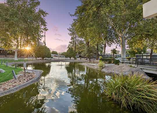 Community Pond and Landscape at Lakeside Casitas Apartments located in Tucson, AZ.