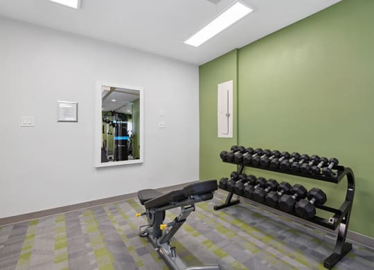 Community Fitness Center with Equipment at Crystal Creek Apartments in Phoenix, AZ.