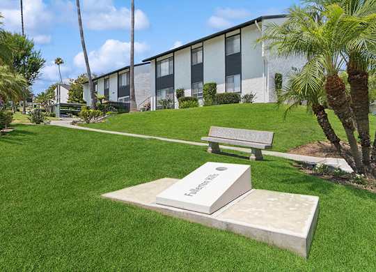 Outdoor Corn Hole Area at Fullerton Hills Apartments located in Fullerton, CA.