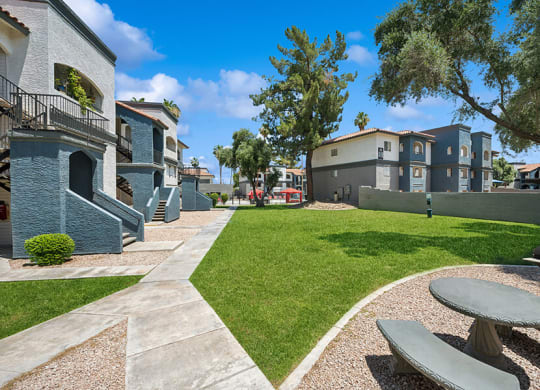 Exterior Community Building and Landscape at Country Club Verandas Apartments located in Mesa, AZ.