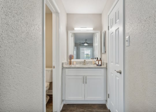 a view of a bathroom with a white door