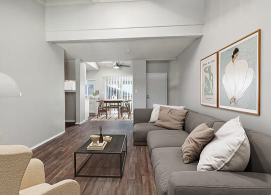 Model Living Room with Wood-Style Flooring at Colonnade at Fletcher Hills Apartments in El Cajon, CA.