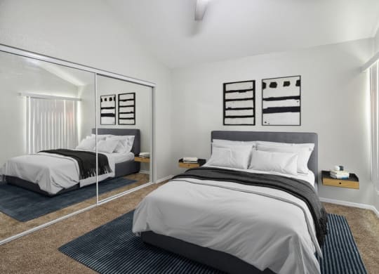 Model bedroom with mirror door closet