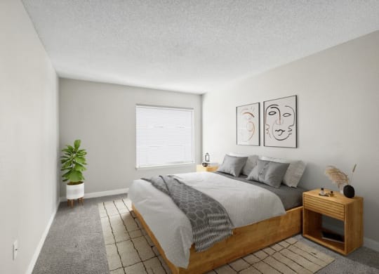 Model bedroom with queen-size bed