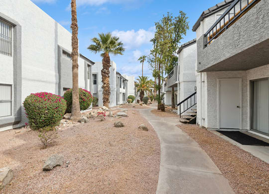 Exterior Community Building and Landscape at Crystal Creek Apartments in Phoenix, AZ.