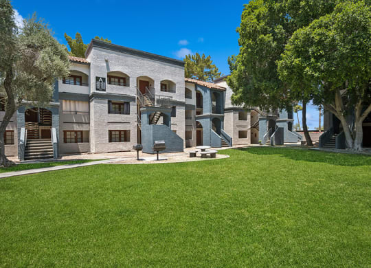 Exterior Community Building and Landscape at Country Club Verandas Apartments located in Mesa, AZ.