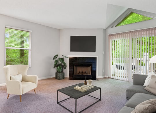 Model Living Room with Carpet, Fireplace and Patio Accessibility at Park 2300 Apartments in Charlotte, NC.