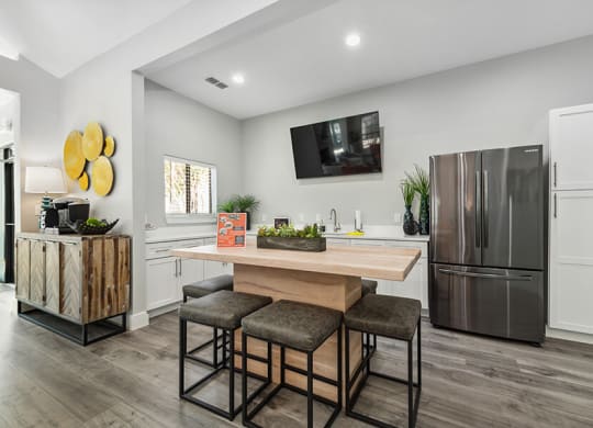 Community Clubhouse Kitchenette with Island Bar at Bridges at Deer Run Apartments in Dallas, TX.