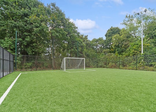 Community Soccer Field with Nets at Heights at Marlborough Apartments located in Marlborough, MA.