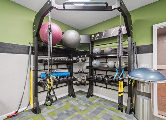 Community Fitness Center with Equipment at Westland Park Apartments in Jacksonville, FL.