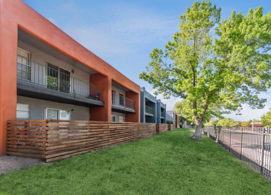 Exterior Community Building and Landscape at Indigo Park Apartments in Albuquerque, NM.