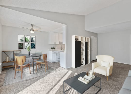 Model Living Room with Carpet and View of Dining Room at Bridges on Sunset Apartments in Suisun City, CA.