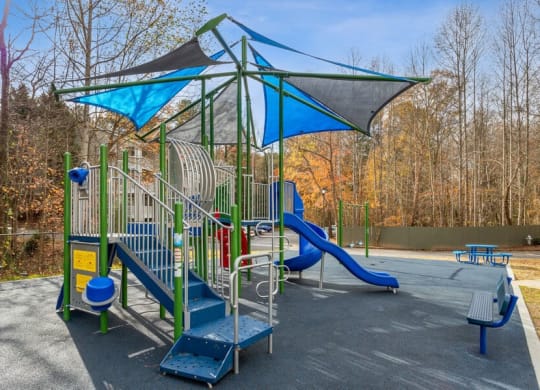Community playground with padded play surface