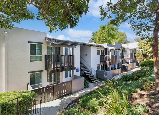 Exterior Community Building and Landscape at Colonnade at Fletcher Hills Apartments in El Cajon, CA.