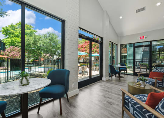 Community Clubhouse with Lounge Furniture at Bridges at Deer Run Apartments in Dallas, TX.