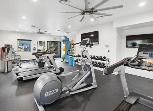 Community Fitness Center with Equipment at Ridgeline Apartments in Tucson, AZ.