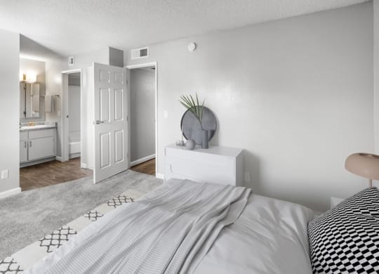 Model bedroom with queen bed